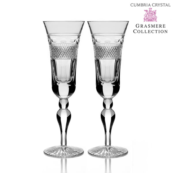 Two Crystal glasses cut Grasmere Tall Champagne Flutes.